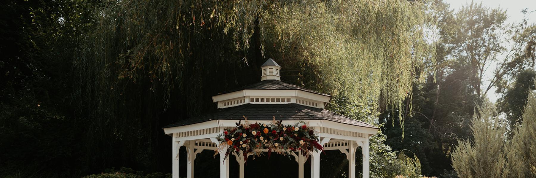 abigails garden gazebo with full flower coverage across the top