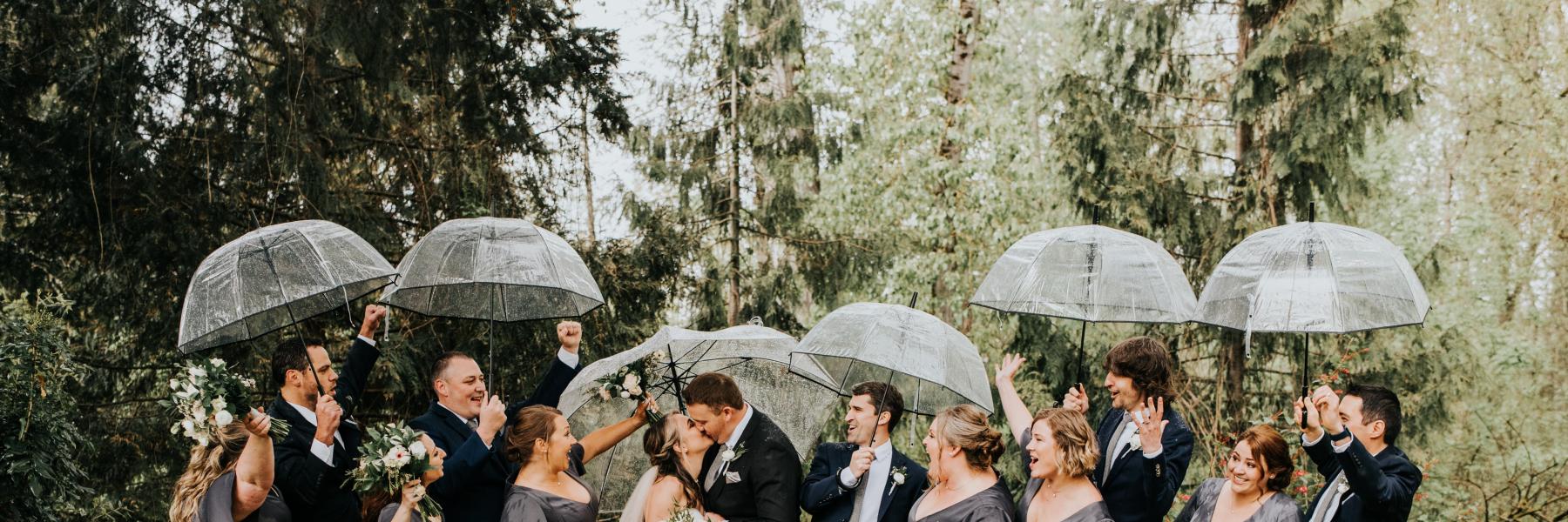 wedding party with umbrellas