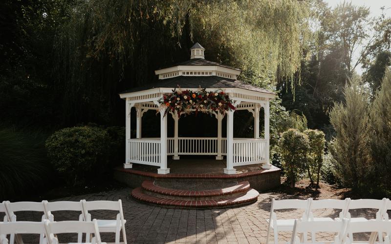 abigails garden gazebo with full flower coverage across the top