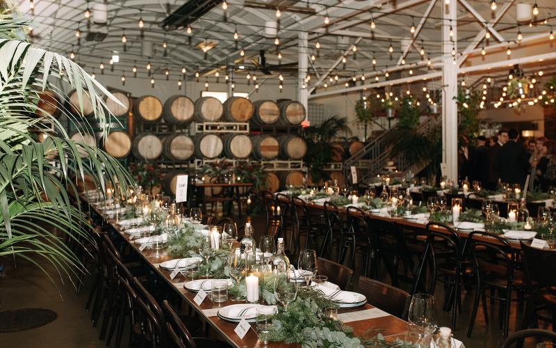 long tables with garland and candles