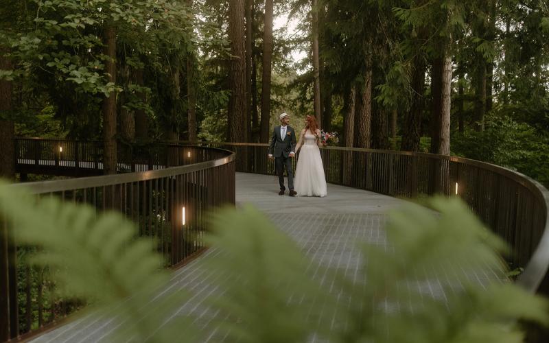 bride and groom walking on deck