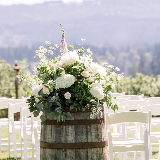 Large arrangement on wine barrel