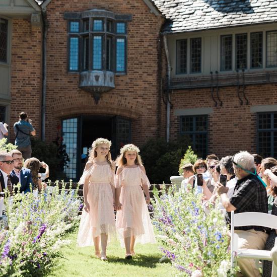 Large arrangements lining the aisle