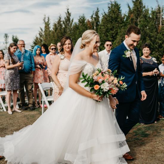 bride and groom walking down the aisle