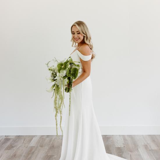 Alexa holding cascade bouquet