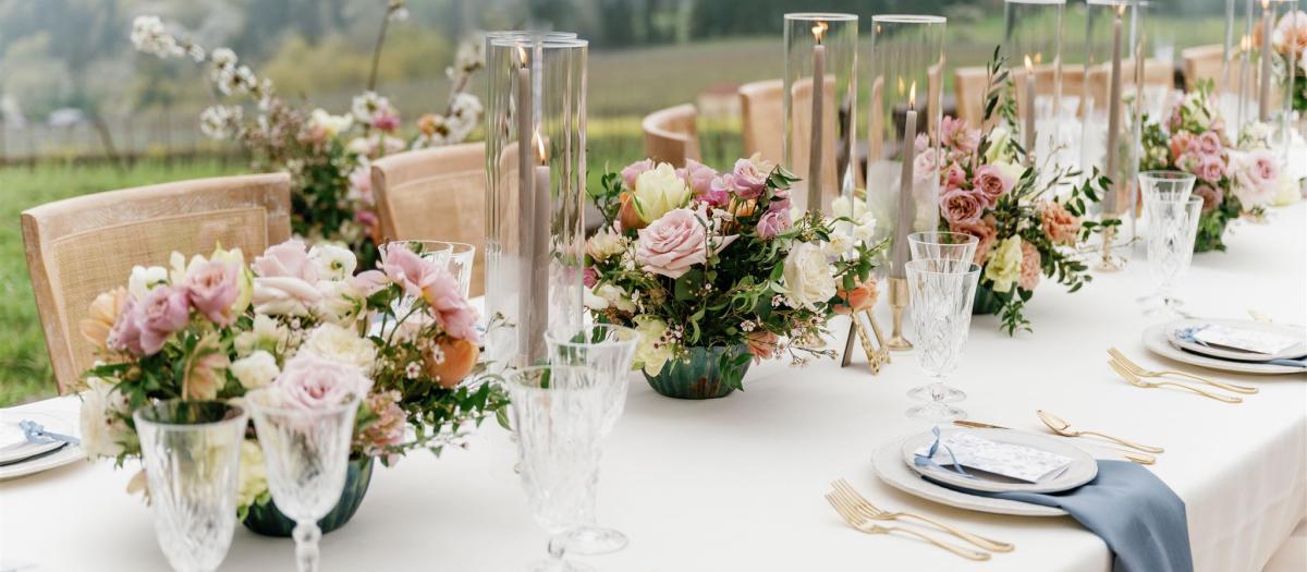 table scape with medium arrangements and taper candles