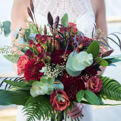 full bouquet with fern, roses, and eucalyptus